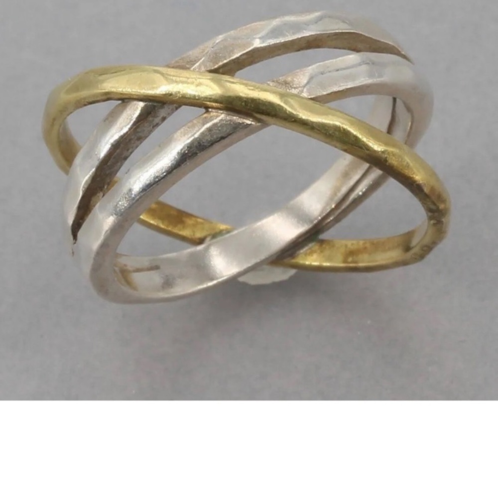 Retired crossover ring. Size 6. Sterling silver and brass.